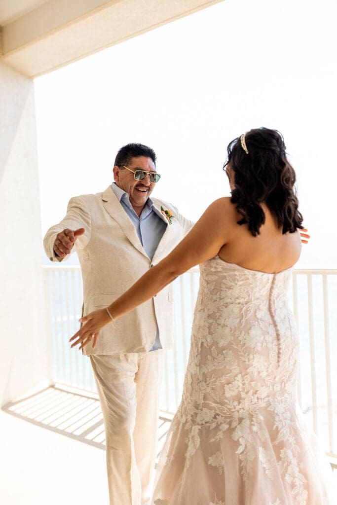 Father of the bride seeing her for the first time and preparing to walk her down the aisle to her groom | Madison Abernathy Photography